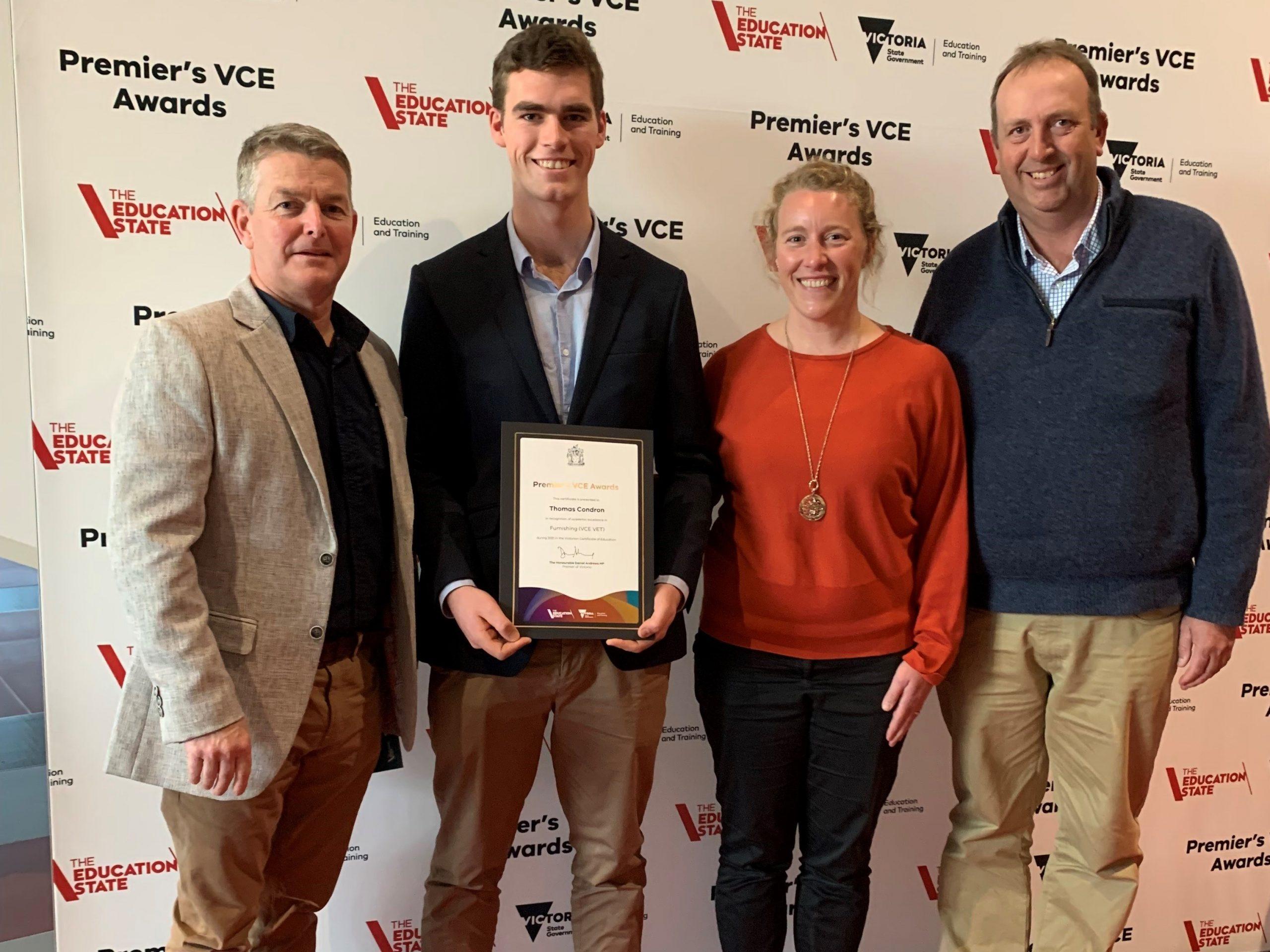 Gippsland Grammar Old Scholar Tom Condron at this week’s VCE Premier’s Awards with (from left to right) Gippsland Grammar Furnishing teacher Nick Kuch and parents Ellen and Gary Condron.